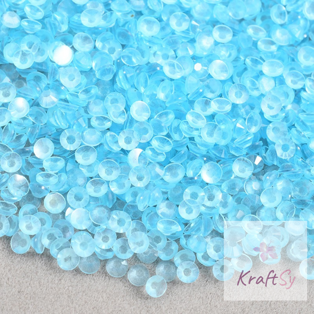 Lt. Sapphire Glow in the Dark Flatback Resin Rhinestone in Bulk